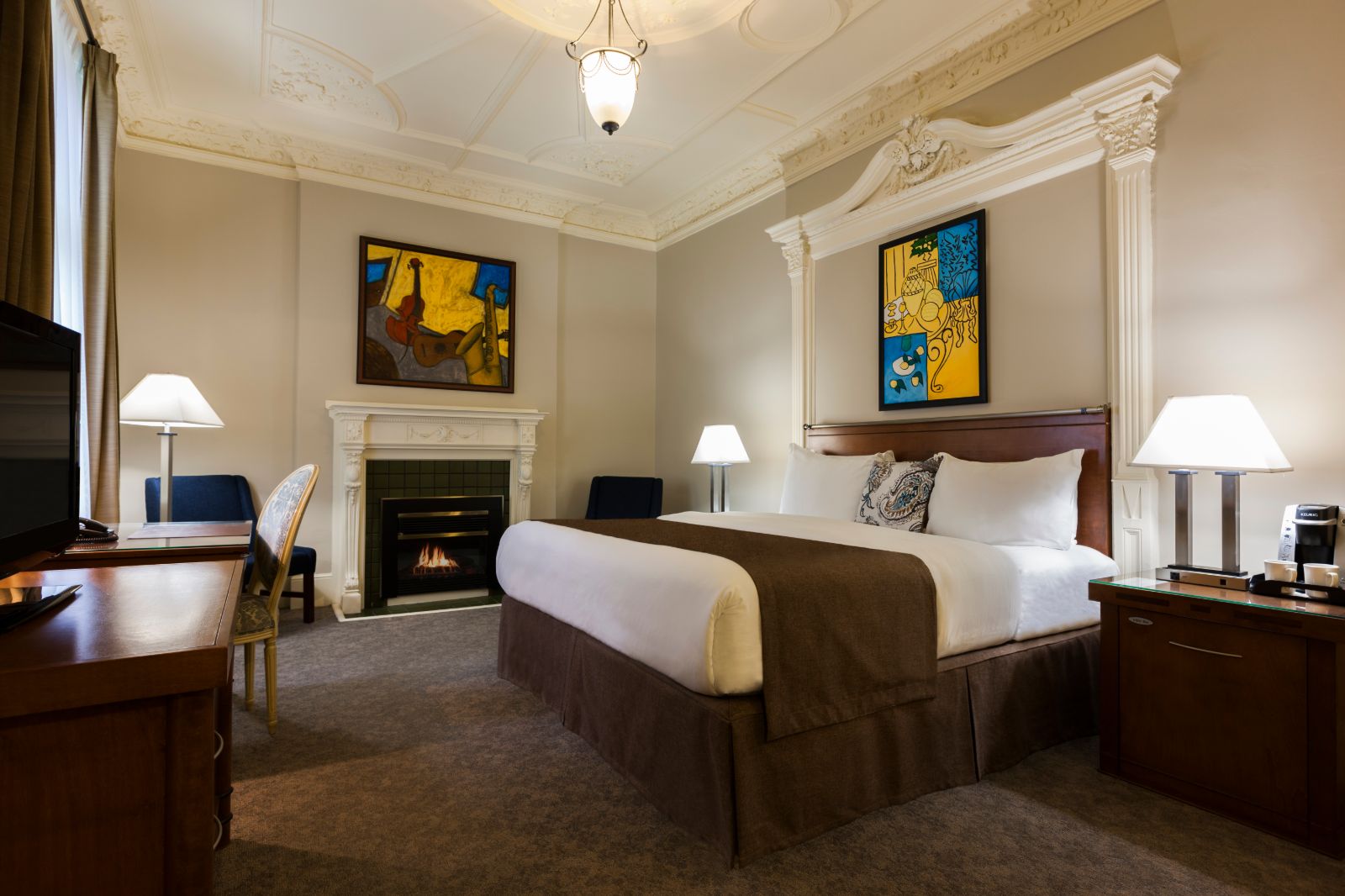 Château Versailles Fireplace Suite in luxury boutique hotels in montreal king bedrooms